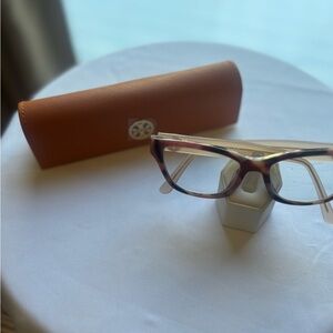 Pink tortoise shell Tory Burch frame.